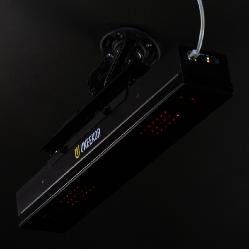 Uneekor Eye XR Launch Monitor Mounted on Black Ceiling Glory Shot