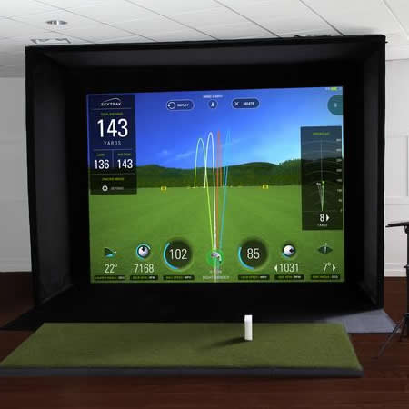 photo of golf simulator displaying ball paths of the users previous swings