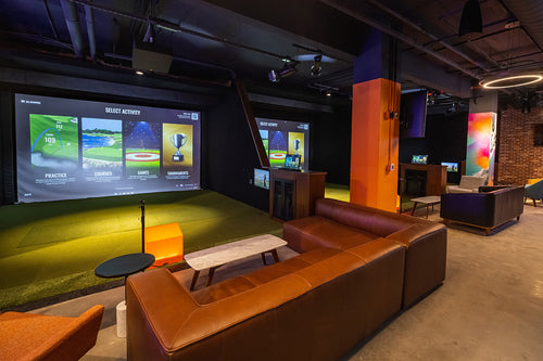 Indoor Golf Center with Seating Area