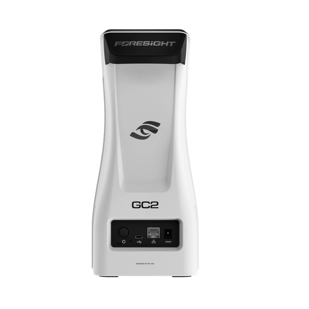 The white rear view of the Foresight GC2 portable golf launch monitor with a black handle at the top  and USB-C and ethernet connection panel.