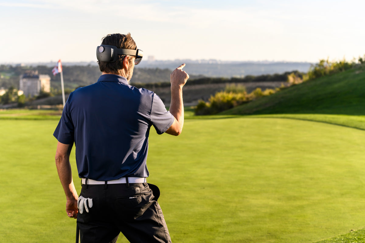 Golfer Using PuttView X Glasses Virtual Hand Control