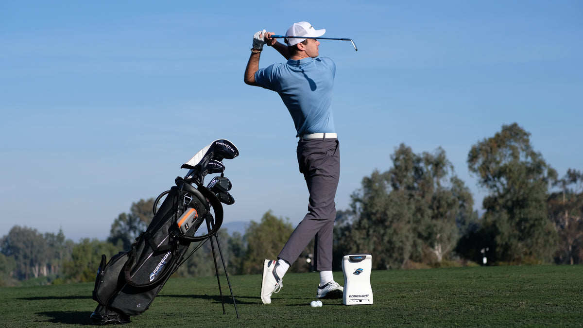 Golfer on range using Foresight QuadMax