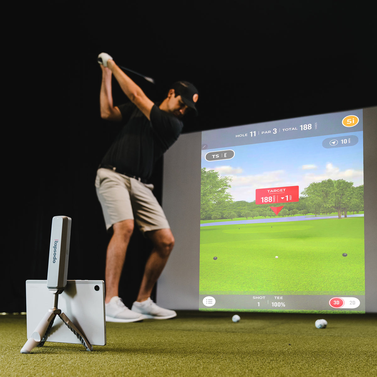 Rapsodo MLM2 Pro Behind Golfer in Indoor Golf Simulator