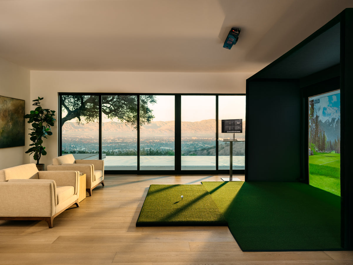 Uneekor Living Room with Golf Simulator and Mountain View