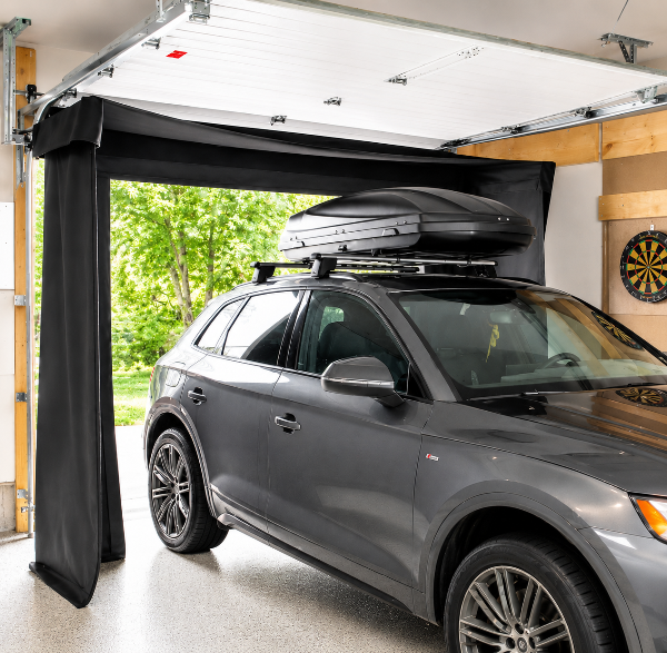 Vanish Lite Golf Simulator Enclosure Between Garage Rails with Car In Garage